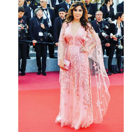 At the Cannes Film Festivals 2018 Elissa was wearing in a homogeneous rose color a dress  by international Lebanese fashion designer Elie Saab.